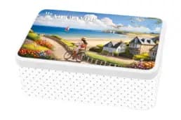Boîte à sucre souvenir Normandie illustrée d'une femme à vélo face à la mer et aux falaises normandes