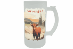 Chope givrée souvenir Auvergne illustrée d'une vache Salers et de la cathédrale