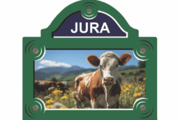 Magnet plaque de rue souvenir Jura avec une vache dans un pâturage