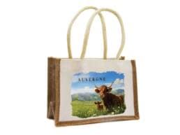Sac en jute souvenir Auvergne illustré d'une vache Salers dans les montagnes