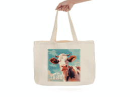 Tote bag souvenir Jura avec illustration artistique d'une vache