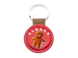 Porte-clés rond simili cuir Alsace avec personnage Mannele et sucre d'orge